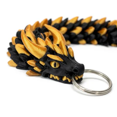 Kayra Hareketli Ejderha Anahtarlık, Çift Renkli Siyah-Altın, Oynar Çene ve Bükülen Gövde, 10 cm Ejder Figürü, Stres Atıc